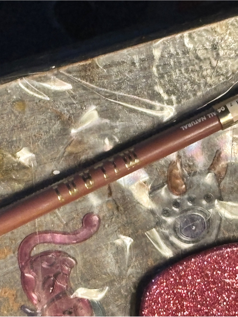 Mailanni lip Pencil in Metallic Brown& reddish pink color